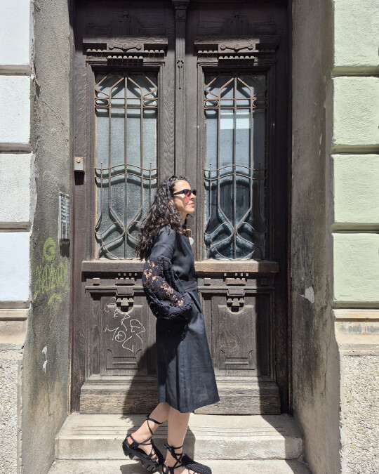 Image of Black dress with long sleeves