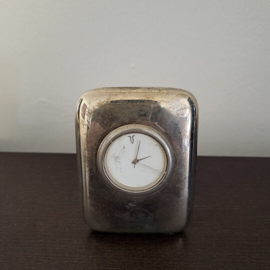 Image of Antique small car metal watch
