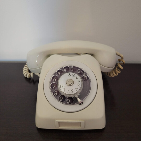 Image of White Vintage Rotary Phone from 70s